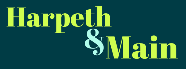 Logo of Harpeth & Main with green text on a dark teal background
